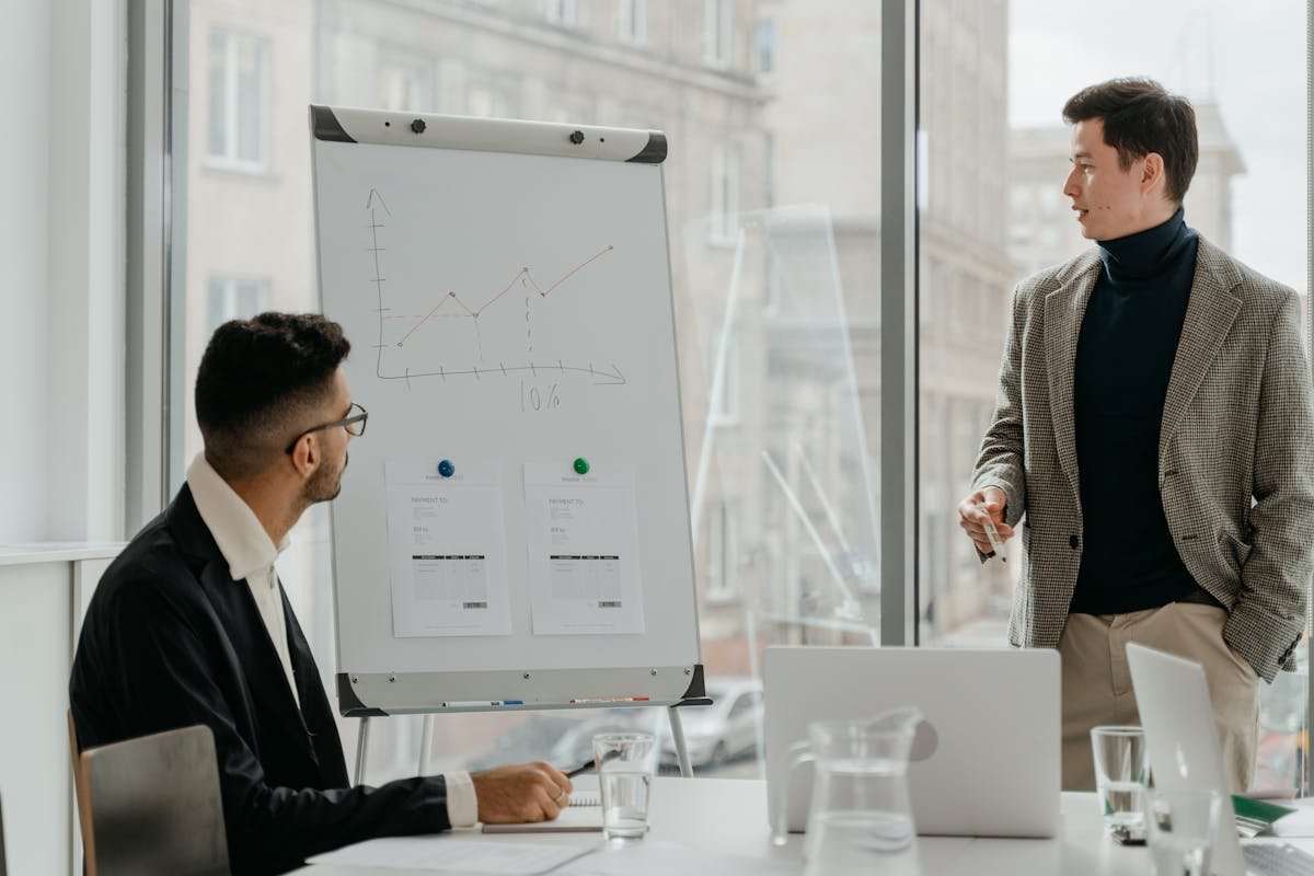 Top Local Internet Marketing Techniques to Boost Your Business in 2024 2 Man in Black Suit Jacket Writing on White Board